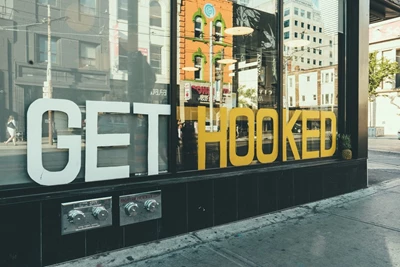 3 Things to Consider When Designing Your Storefront Window Signage
