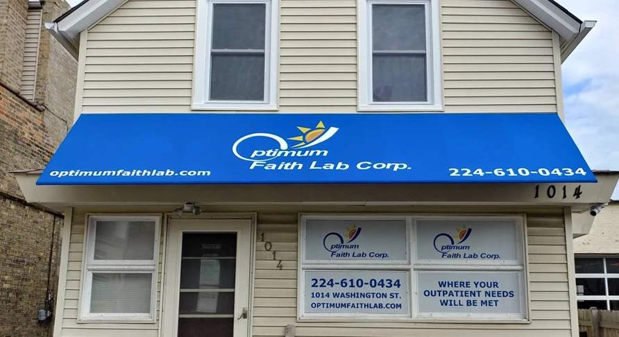 Sunbrella fabric awning with business logo, phone and website in Waukegan, IL