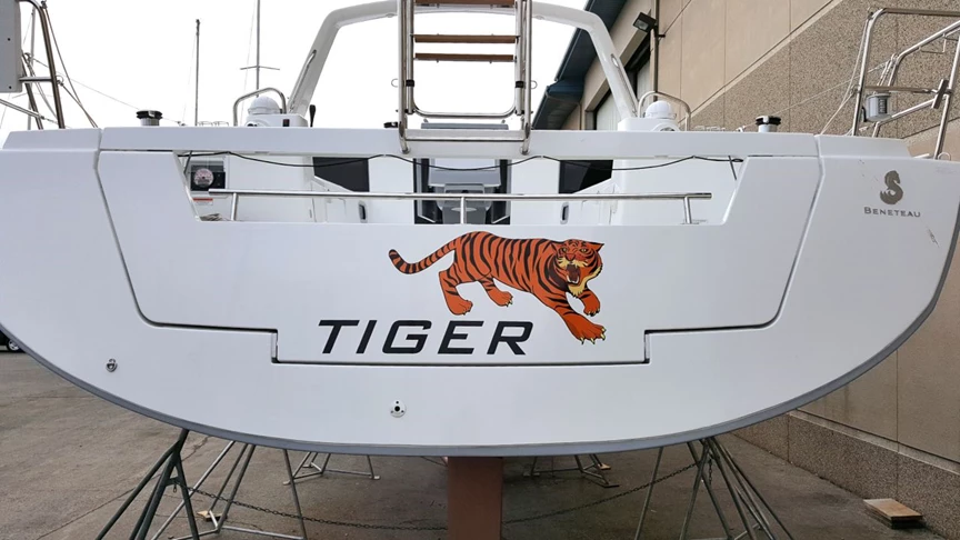 Boat name lettering and graphic installed on transom of sailboat.  Sailplace Kenosha WI