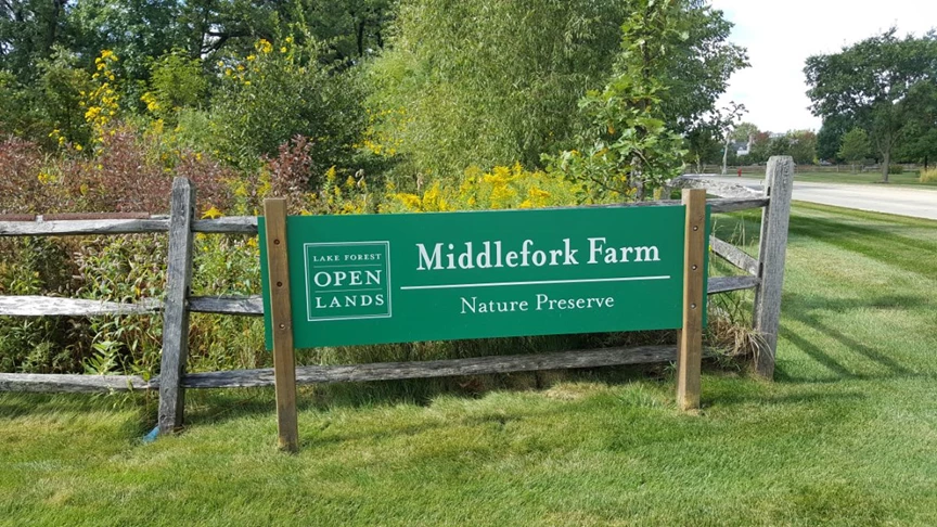 Post and Panel sign with cedar posts and aluminum panel with reflective lettering at park in Lake Forest, IL