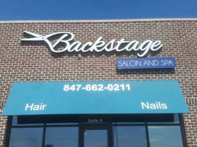 LED lighted channel letters with cloud box for Backstage Salon and Spa.  Gurnee, IL
